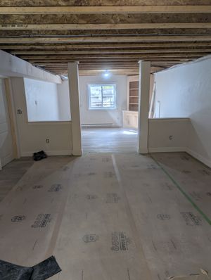 Whole-home renovation featuring open concept living area